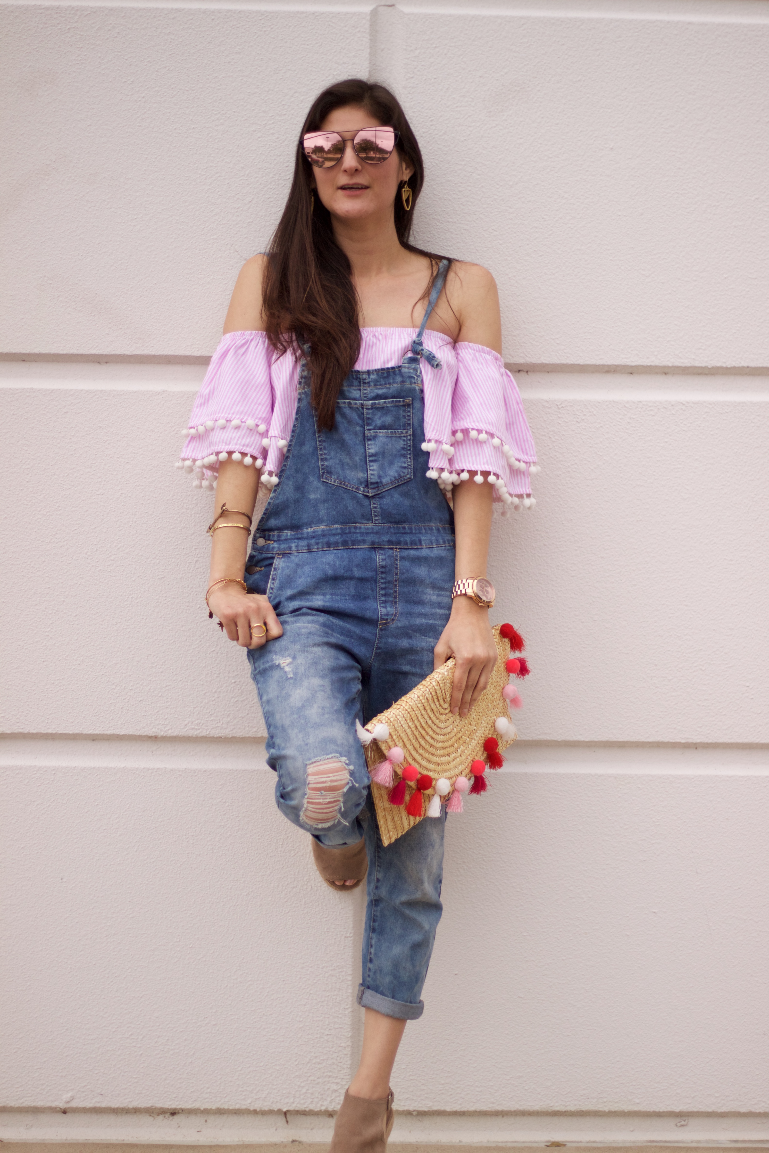 Jenni Metz Fashion blogger modeling overalls and off the shoulder top