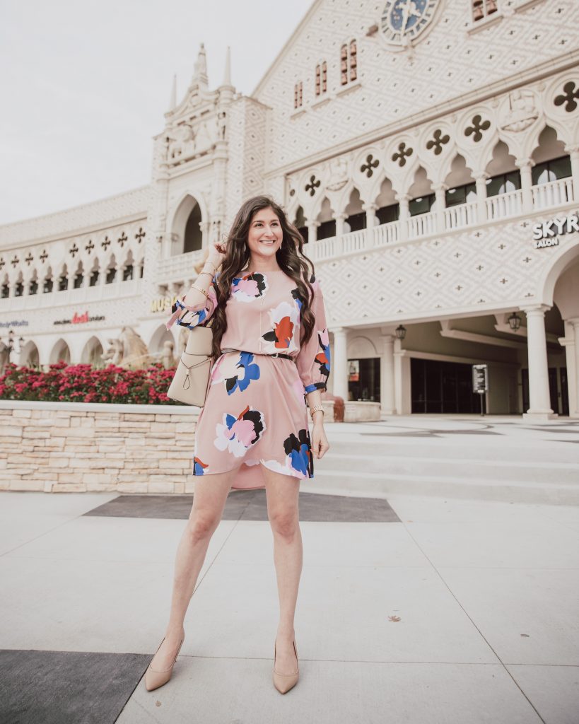 Midi floral dresses are in for spring style this season. Cute blush pink dress for Easter or Sunday brunch. Click to see more fashion blogger style. #Springstyle #fashionblogger #fashionblog