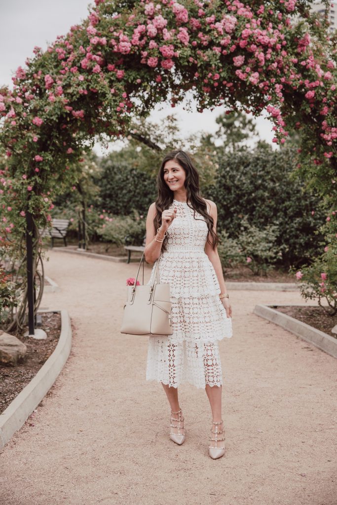 White crochet dress perfect for Easter. Sleeveless elegant dress. 5 dress styles for Easter. The Fashionable Maven