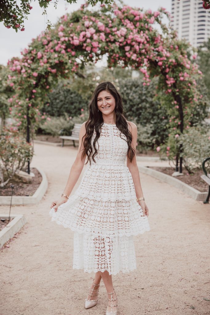 White crochet lace dress perfect for Easter, rehearsal dinner, or bridal shower. Three tiered lace skirt with nude lining and sheer décolletage.   