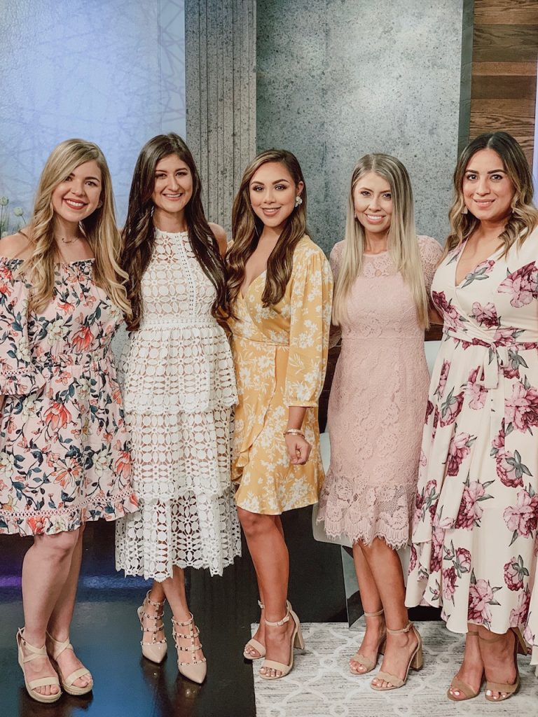5 women including Jenni Metz-The Fashionable Maven are standing in the studio modeling their outfits from Lulus for spring fashion segment on Houston life.
