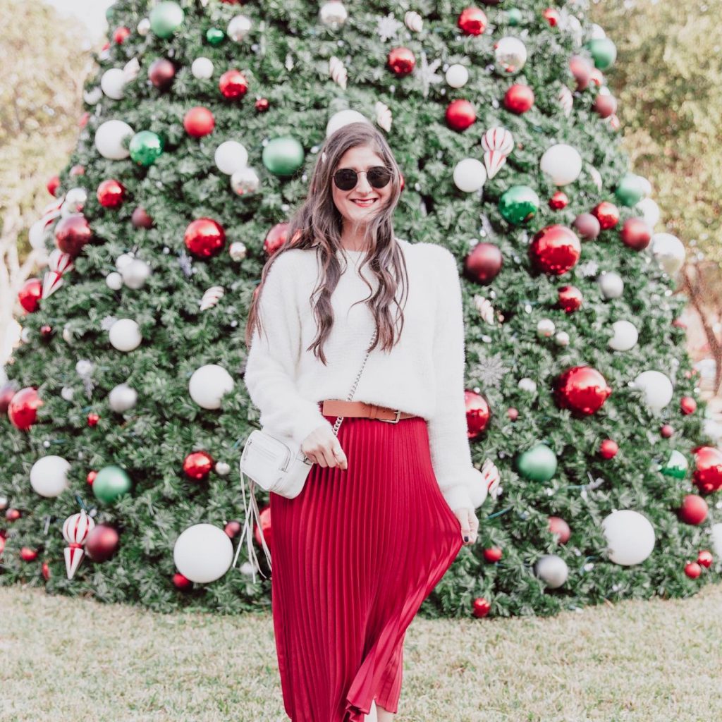 Christmas style with a pleated midi skirt.