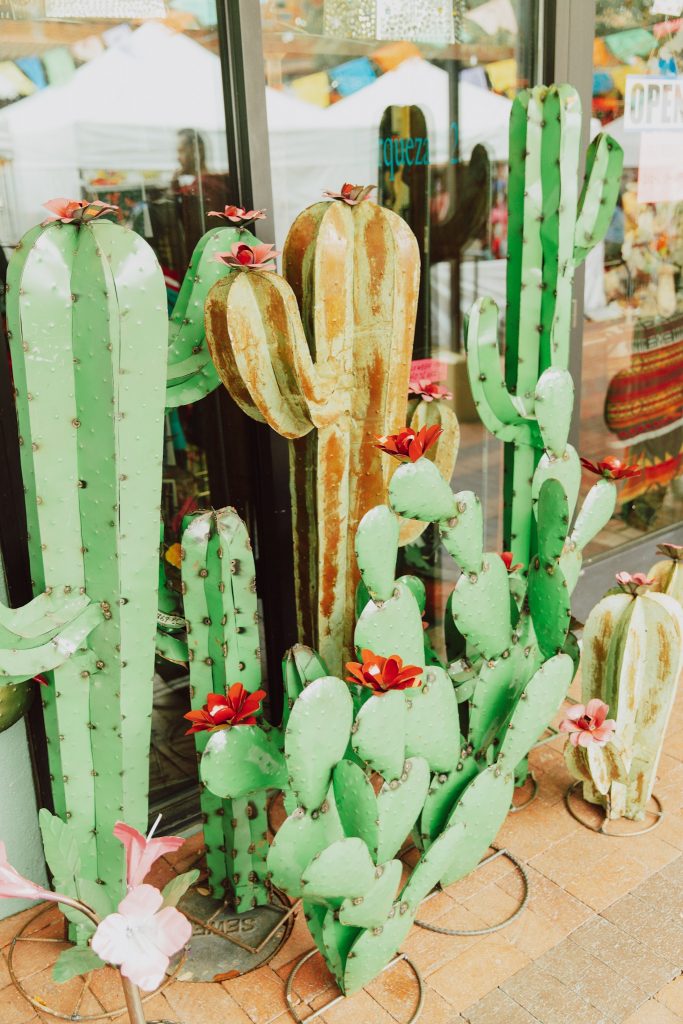 Metal cactus decor from El Mercado San Antonio guide.