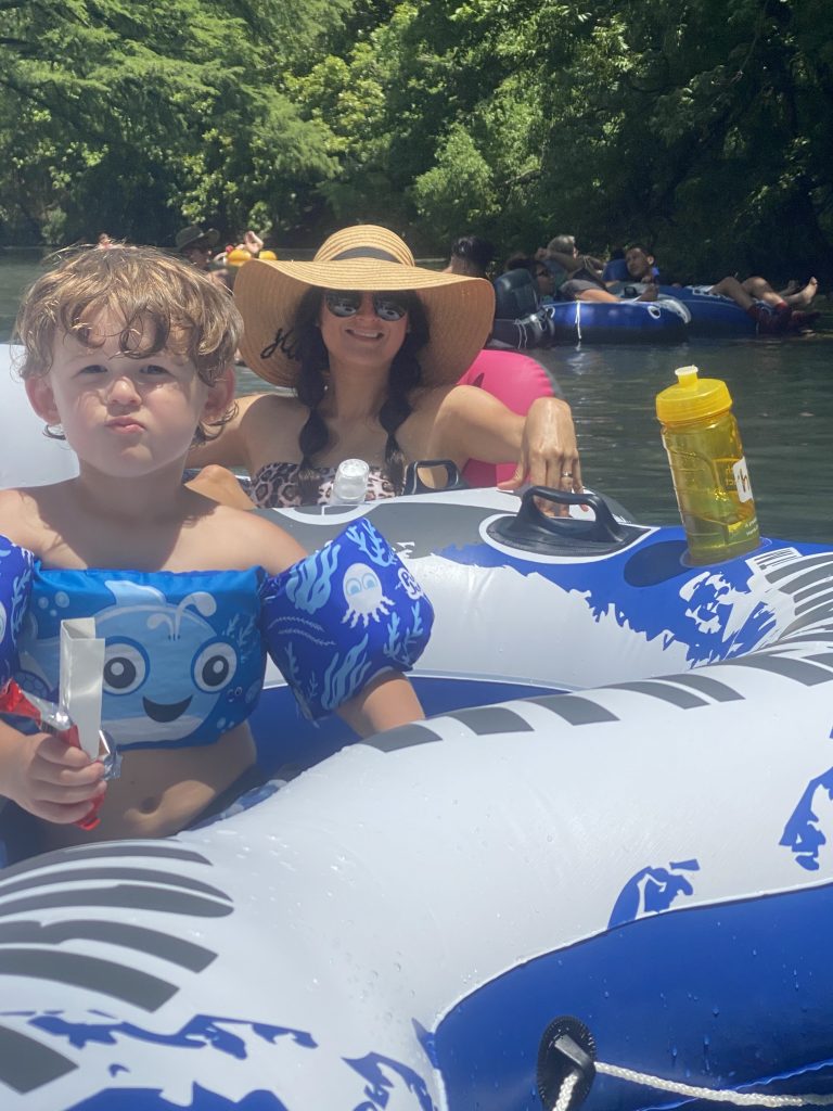 Jenni Metzler and her son on the San Marcos River, TX. The Fashionable Maven