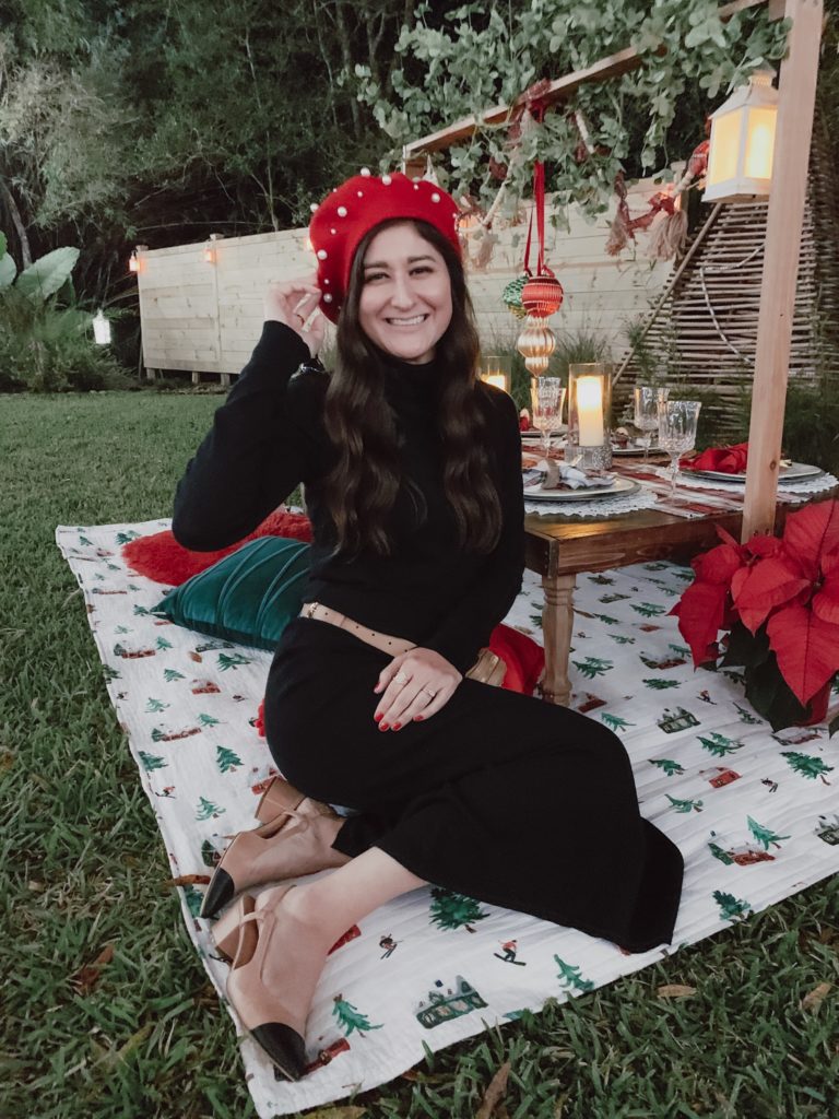 Jenni Metz of The Fashionable Maven is wearing a maxi turtleneck dress and a beret in this post about fall outfit ideas for women in their 30s.
