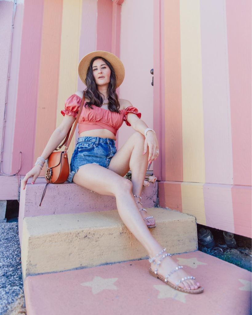 Cute spring outfits. Jenni Metz Wearing a crop top & high waisted shorts. Amazon fashion finds. 