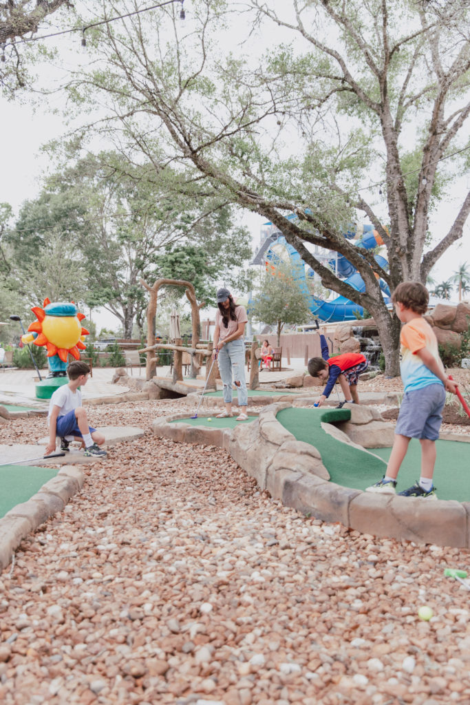 Jenni Metzler family at Splashway playing mini golf.