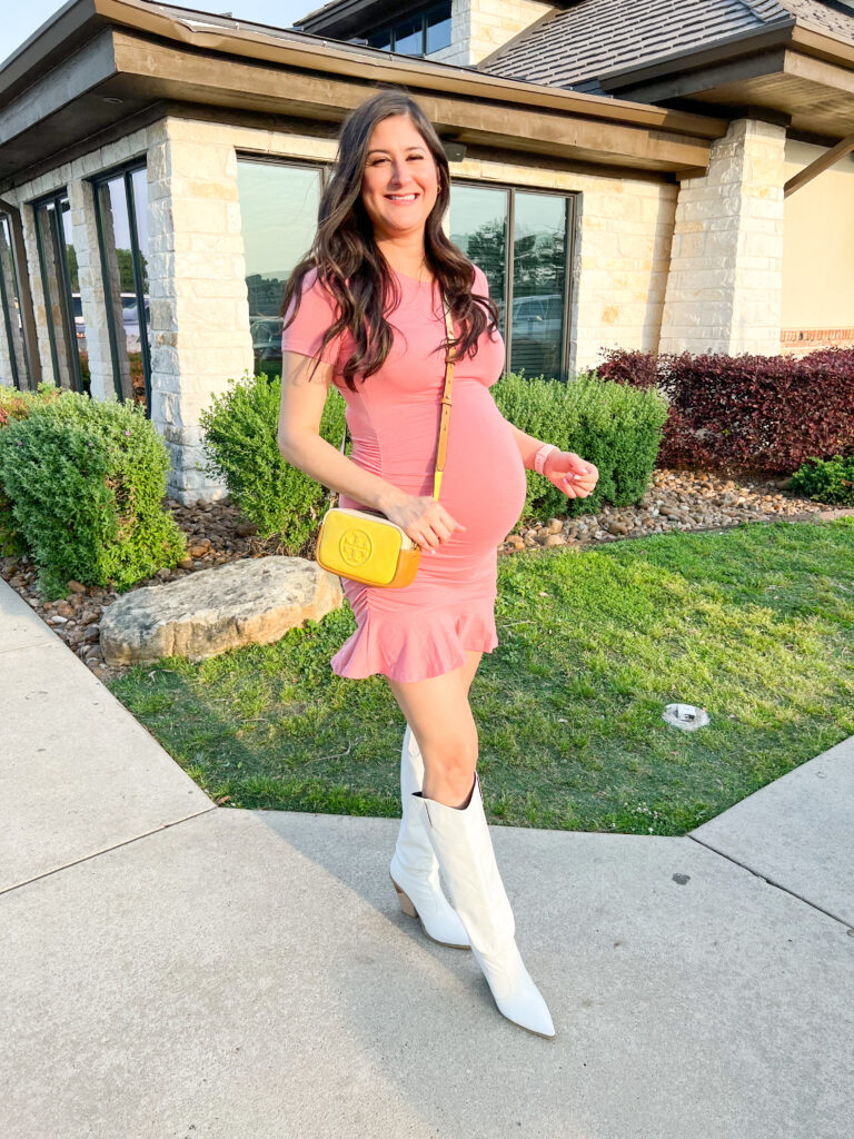 cowboy boots outfits women: Jenni Metzler pregnant wearing a dress with ruffled hem and white boots.